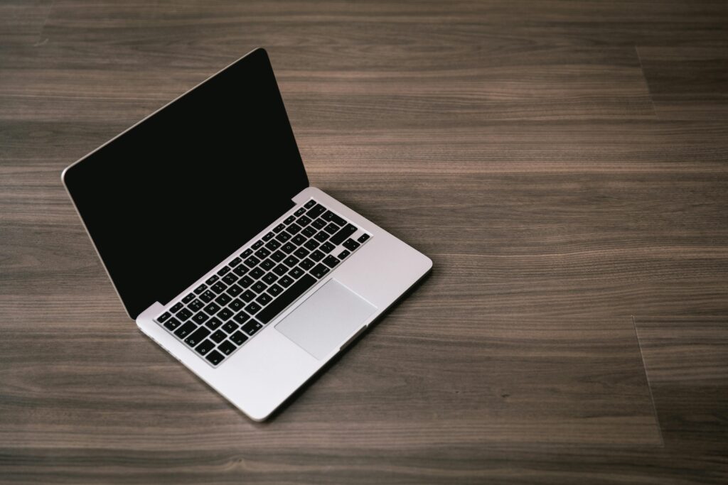 a macbook on table